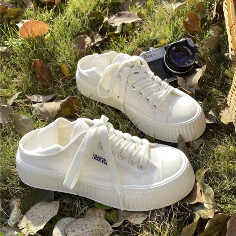 White Canvas Slip-On Sneakers