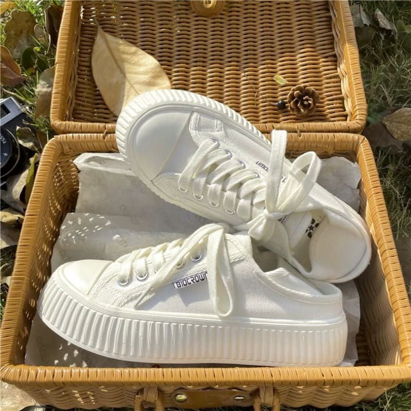 White Canvas Slip-On Sneakers