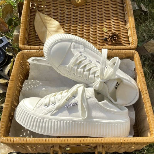 White Canvas Slip-On Sneakers