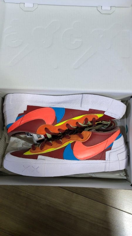KAWS × Sacai × Nike Blazer Low Team Red