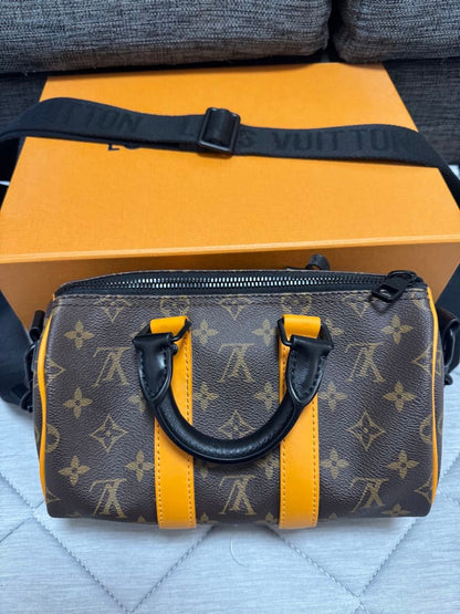 Louis Vuitton Keepall Bandouli re 25 Mini Boston Shoulder Bag